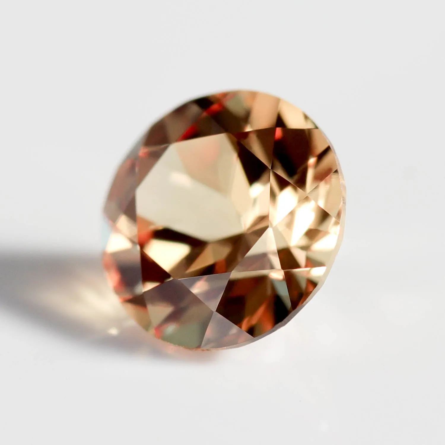 . Lab-grown Orange Sapphire