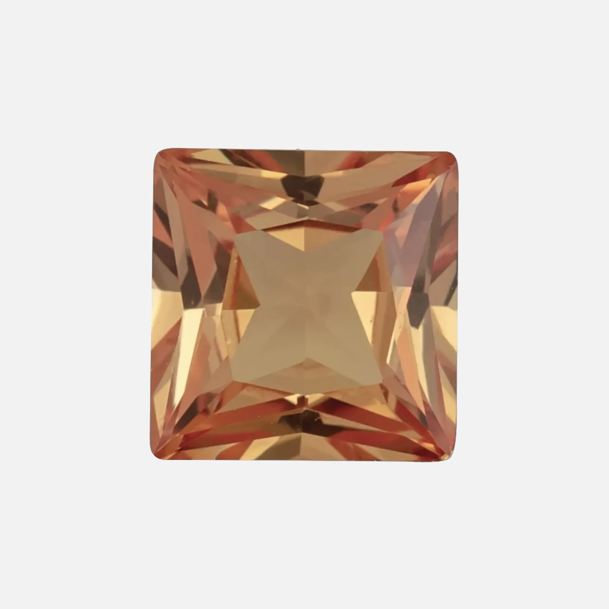 . Lab-grown Orange Sapphire
